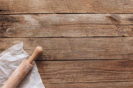 Baking concept flat lay. Ingredients, kitchen utensils, wooden backgroundの写真素材