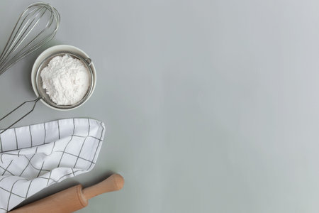 Baking concept flat lay. Ingredients, kitchen utensils, grey concrete background