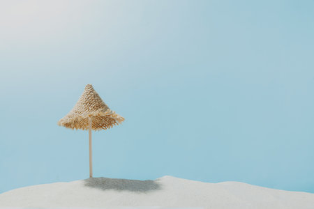 Vacation, beach, travel, relaxation concept. Symbolic background with beach sand, mini sun lounger, blue sky, clouds, sea or ocean. Minimalism with copy space for business advertisement. Relax timeの写真素材