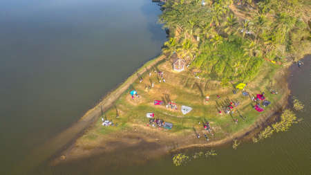 Aerial view, camp on the edge of a Sermo reservoir during the dry season in the morning.の写真素材