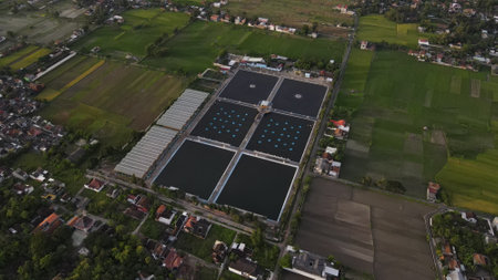 Aerial view wastewater treatment plant. Filtration of dirty water or waste water located in Bantul, Yogyakarta, Indonesia.のeditorial素材