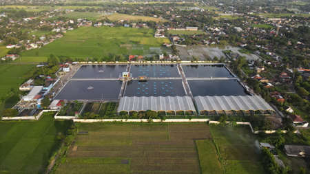 Aerial view wastewater treatment plant. Filtration of dirty water or waste water located in Bantul, Yogyakarta, Indonesia.のeditorial素材