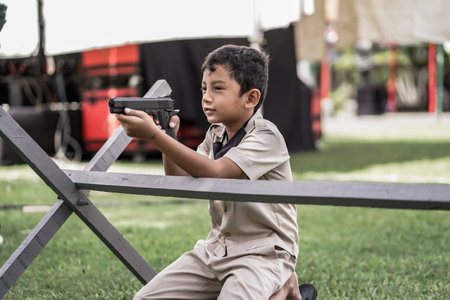 theatrical war general attack 1 march, using war uniforms and weapons in the Dutch colonial era. They shoot each other. : Yogyakarta, Indonesia - 01 March 2022のeditorial素材