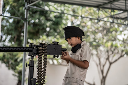 theatrical war general attack 1 march, using war uniforms and weapons in the Dutch colonial era. They shoot each other. : Yogyakarta, Indonesia - 01 March 2022のeditorial素材