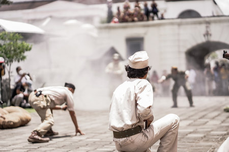 theatrical war general attack 1 march, using war uniforms and weapons in the Dutch colonial era. They shoot each other. : Yogyakarta, Indonesia - 01 March 2022のeditorial素材
