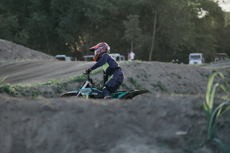 the motocross riders practice together to improve their skills on the Sultan Agung circuit. :...
