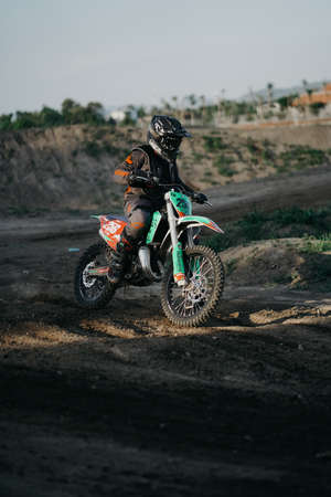 the motocross riders practice together to improve their skills on the Sultan Agung circuit. : Bantul, Indonesia - 11 August 2021のeditorial素材