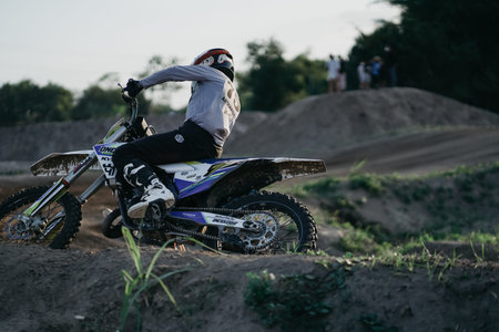 the motocross riders practice together to improve their skills on the Sultan Agung circuit. :...