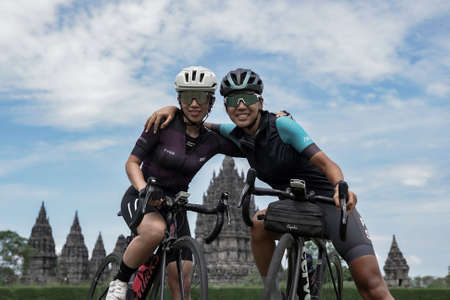 A group of road bike athletes from Mula and Nusantara pro cycling competed on the road, preparing for a test route for the Tour de ambarrukmo 2022. : Sleman, Indonesia - 21 May 2022のeditorial素材
