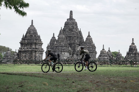 A group of road bike cyclists with fast speeds passing through the road and preparing for the test route for the Tour de ambarrukmo 2022. : Sleman, Indonesia - 21 May 2022のeditorial素材