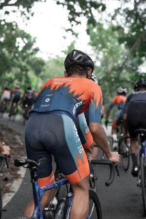 Cycling using a road bike with friends, preparing for a test route for the Tour de ambarrukmo 2022. : Sleman, Indonesia - 21 May 2022のeditorial素材