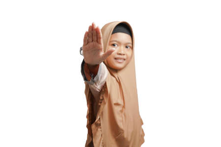 a girl wearing a hijab, wearing a brown Muslim dress which gives an ok sign if she agrees. white backgroundの写真素材