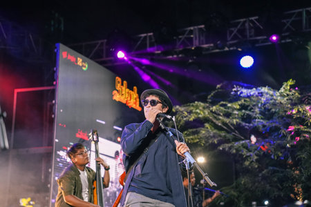 Music Festival. The performance of Jikustik, a band from Yogyakarta. The audience cheers and enjoys...