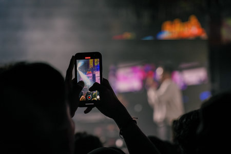 Music Festival. The performance of Jikustik, a band from Yogyakarta. The audience cheers and enjoys the music. : Yogyakarta, Indonesia - 07 September 2022のeditorial素材