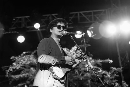 Music Festival. The performance of Jikustik, a band from Yogyakarta. The audience cheers and enjoys the music. : Yogyakarta, Indonesia - 07 September 2022のeditorial素材