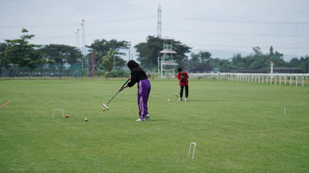 Playing Gateball in an open space at the Sultan Agung stadium. . : BANTUL, Indonesia - 28 February...