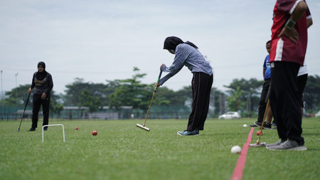 Playing Gateball in an open space at the Sultan Agung stadium. . : BANTUL, Indonesia - 28 February...