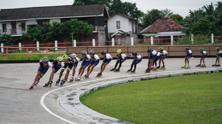 Training with roller skating athletes on the track of the Sultan Agung stadium. BANTUL, Indonesia - 28 February 2021.のeditorial素材