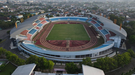 Aerial view, Mandala Krida Stadium with the background of Mount Merapi in the morning. : Yogyakarta, Indonesia - 17 April 2021のeditorial素材