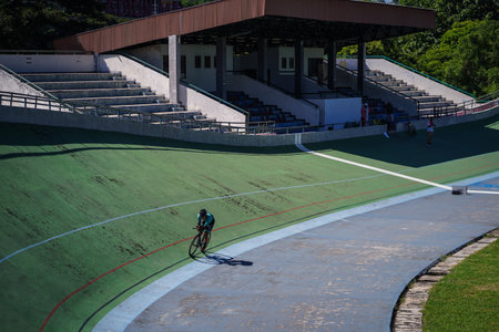 Indonesian paracycling athlete Martin Losu is training to prepare for the next race at the Velodrome Manahan Solo. : Solo, Indonesia - 23 April 2021.のeditorial素材
