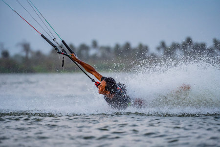 kitesurfing. A surfer who fell and was dragged in the waves. International Kitesurfing Exhibition...