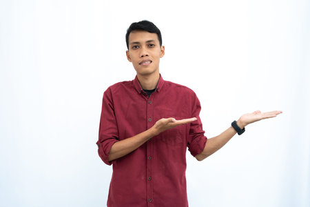 asian man, businessman or student concept wearing red casual shirt posing looking to the side of...