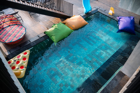 Comfortable and clean swimming pool in the hotel, there are swings, balloon seats, free to play.