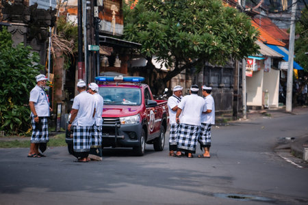 Bali, Indonesia - 08 March 2024: Pecalang, the Balinese traditional security, is guarding the Nyepi...