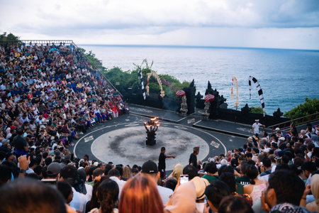 Bali, Indonesia - 08 March 2024: The atmosphere and excitement of the Uluwatu Kecak Dance, which is a famous traditional Balinese dance performanceのeditorial素材