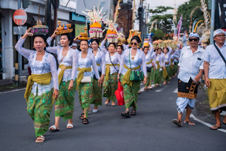 Bali, Indonesia - 08 March 2024: Native Balinese women wearing traditional clothes are performing...