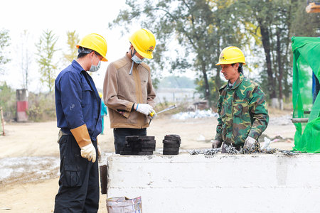 Construction engineer at construction site