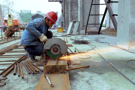 worker using Rebar cutter at construction siteのeditorial素材