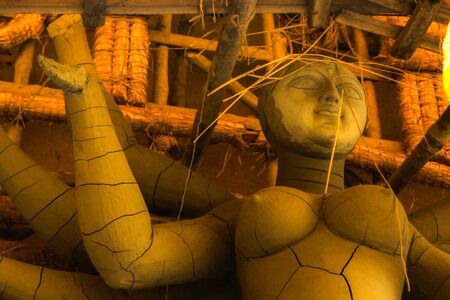 A clay work of goddess done by craftsman before the worshipの写真素材