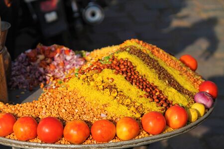 Indian traditional foods mixed with tomato, onions, vegetable ingredientsの写真素材