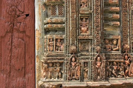 Traditional india story mounted,craved on the walls of a templeの写真素材