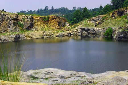 A beautiful view of the reflection of nature over the lakeの写真素材