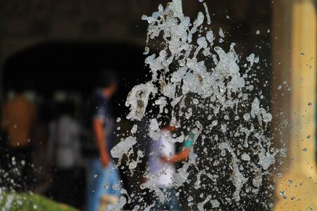 A bursting of water looks like a waterfall explosionの写真素材