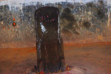 A conventional god sculpture sitting in a vintage place looks unadulterated insideの写真素材