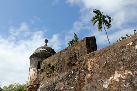 A sentry tower on the corner of a wall of the 16th century Castillo de San Felipe del Morro in San Juan, Puerto, Rico.の写真素材