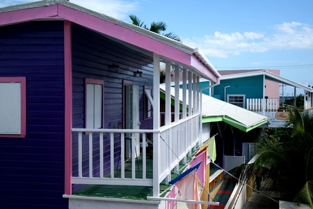 Homes on a Caribbean island are bright with colorful pastels.の写真素材