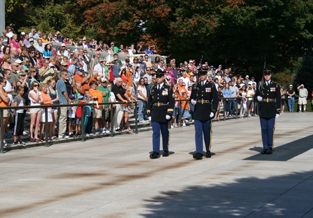 Spectators reverently observe the Changing of the Guard Ceremony, Tomb of the Unknown Soldier, Arlington National Cemetery, Arlington, Virginia.のeditorial素材
