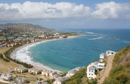 A spectacular view of waves breaking along the shoreline of  Frigate Bay on the Caribbean island of St  Kitts のeditorial素材