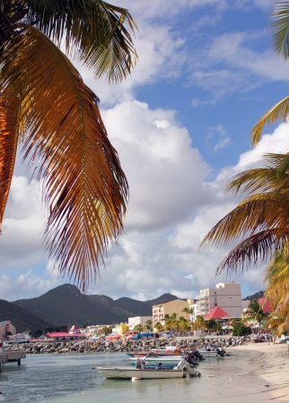 Small boats are moored along a beautiful beach on the Caribbean island of St  Martin  St  Maarten , DWI のeditorial素材