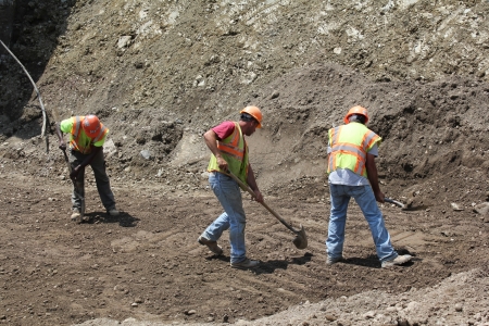 Laborers on a construction project job siteのeditorial素材