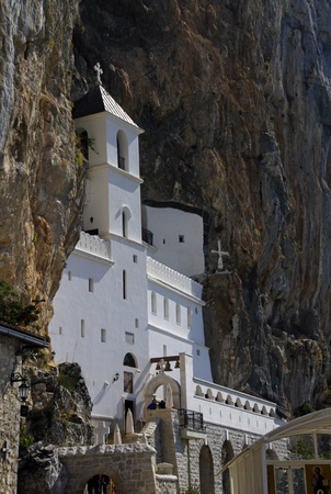 The beautiful sight of the Monastery of Ostrog, which is built into a steep mountain cliffの写真素材