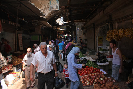 Baalbek, Lebanon - July 5, 2019: Inhabitants of Baalbek, Beirut, shopping for groceries in a bazaar.のeditorial素材