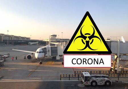 Corona virus - warning sign at airportの写真素材