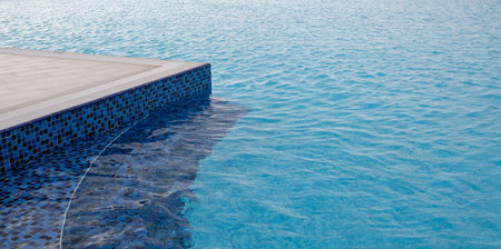 Ripples on the surface of an outdoor pool on a sunny day