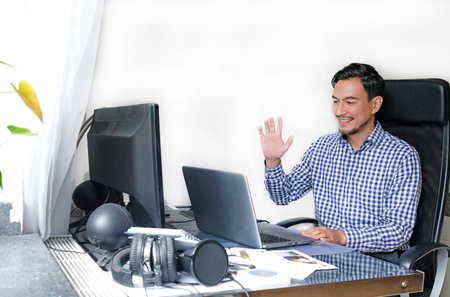 A man working from home at a desk