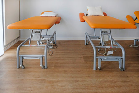 Two examining benches in a doctor's officeの写真素材